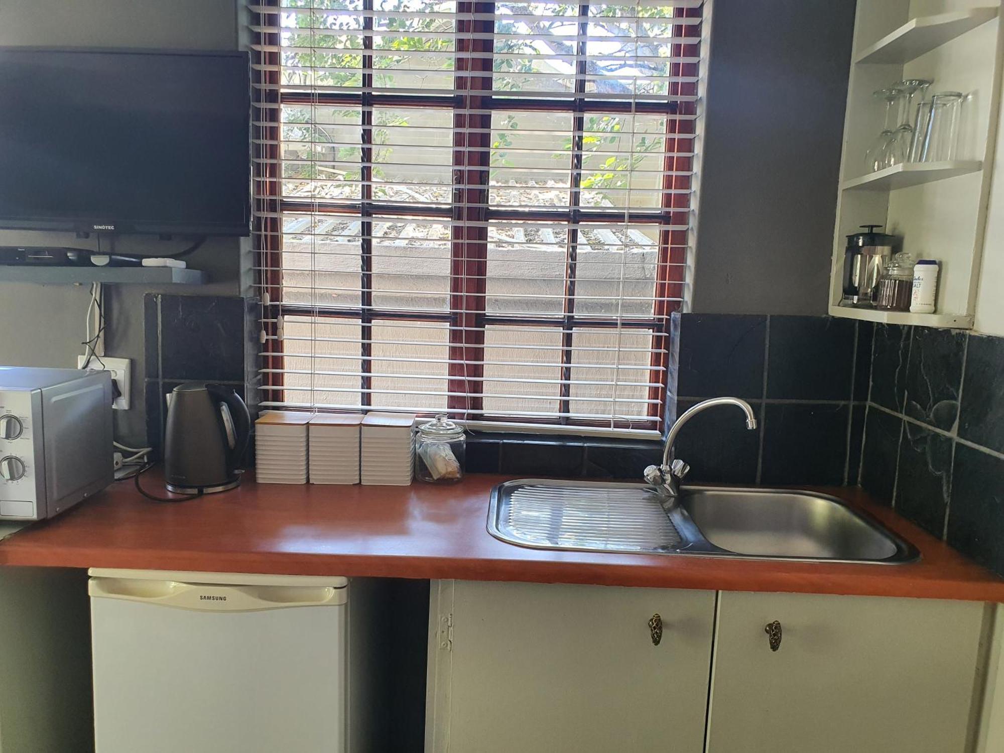 Waterhouse Guest Lodge In Muckleneuk Pretoria-Noord Quarto foto